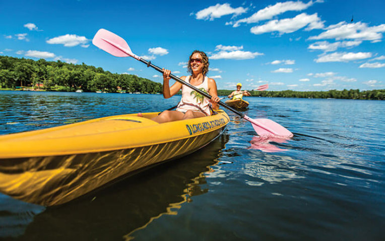 Woman paddling in a kayak