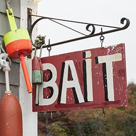 A fishing bait store sign