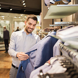 A man shopping for suits