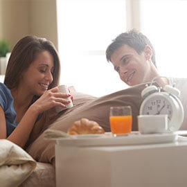 A couple eating breakfast at a bed and breakfast