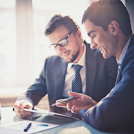 Business men in suits at a meeting