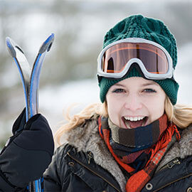 A woman outside at a ski resort