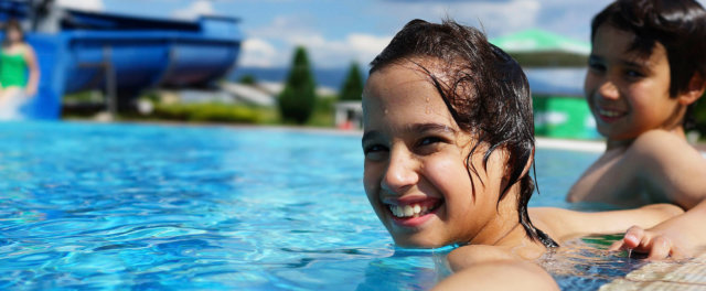 Kids in a pool at a water park