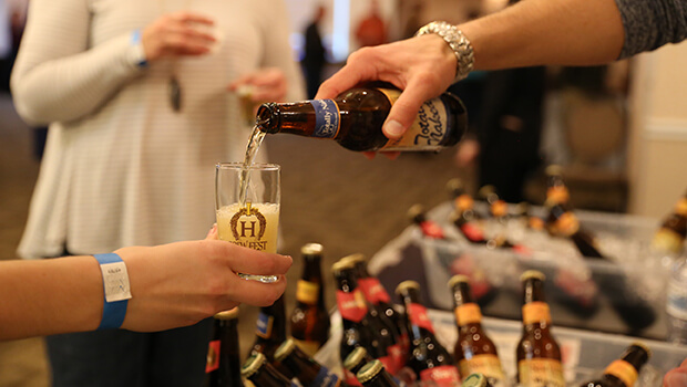 Pouring beer from a bottle